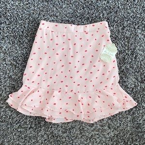 High waisted mini skirt with ruffle detail